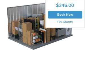 A storage unit filled with a variety of items, including cardboard boxes, furniture, sports equipment, and a washer. A price of $346.00 per month is displayed with a 'Book Now' button.