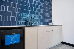 worklocal amenities at the storelocal berrinba facility, showcasing a mini fridge, sink and cupboards